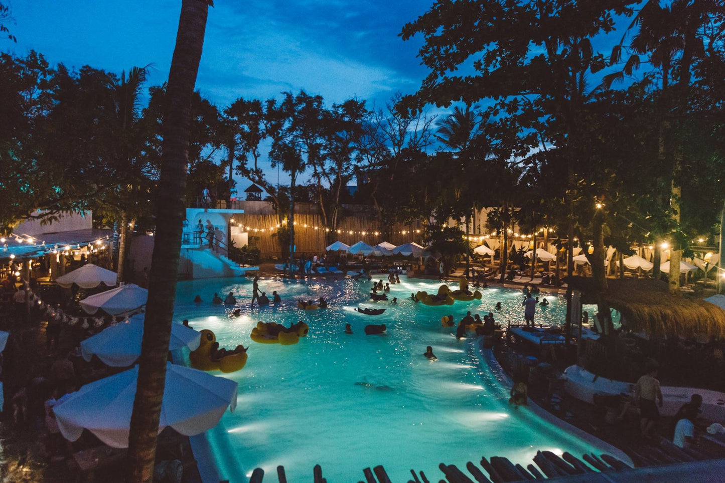 Mrs Sippy Bali Beach Club in Seminyak Pool at Night Time